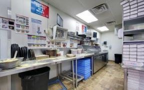 Domino's production area after retrofit. Vanguard Energy Solutions + Independence LED